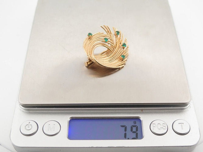 Broche vintage broche epingle tourbillon torsadee or emeraudes 58 Facettes 260447