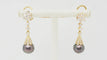 Boucles d'oreilles Boucles d'oreilles en or jaune, Diamants et perles de Tahiti 58 Facettes 32802