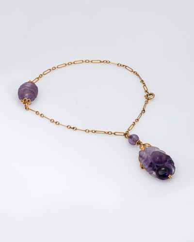 Bracelet Bracelet à breloques Art Nouveau ancien en or jaune et améthyste 58 Facettes G14134