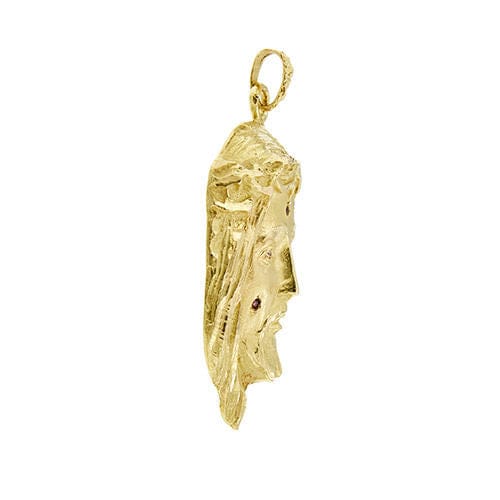 Pendentif Pendentif en or jaune représentant le visage du Christ, orné de rubis et de diamants 58 Facettes 40105