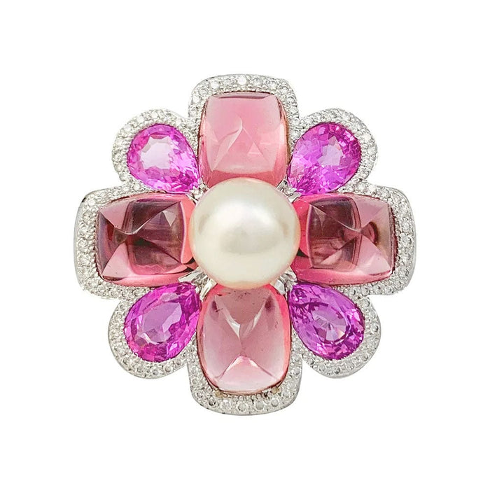 Bague 52 Bague Chanel, "San Marco", or blanc, perle, saphirs roses, tourmalines roses, diamants. 58 Facettes 34030