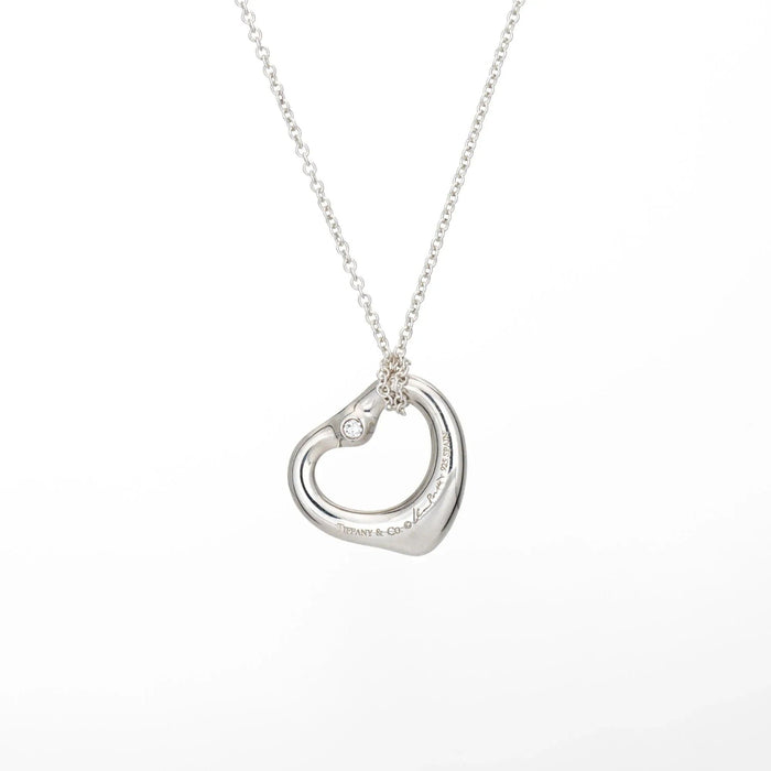 Collier TIFFANY & Co - Collier en argent sterling avec diamants en forme de cœur ouvert 58 Facettes G13568