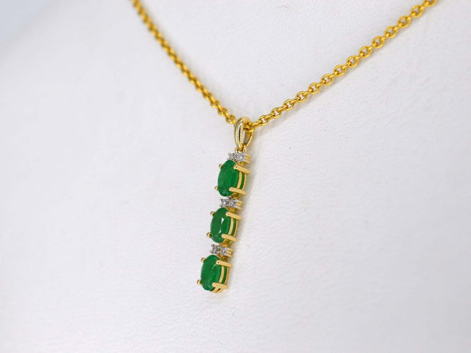 Pendentif Gold pendant with diamonds and emerald 58 Facettes 2141