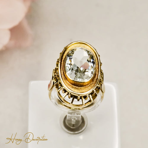 Bague 55 Charmante bague vintage ornée d'une aigue-marine dans un élégant sertissage 58 Facettes 2611