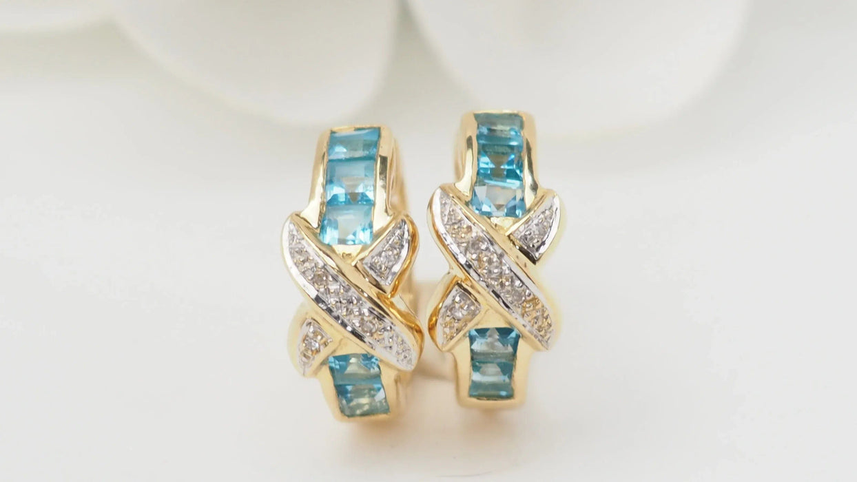 Boucles d'oreilles Boucles d'oreilles créoles en or blanc,Topaze bleue et diamants 58 Facettes 28590