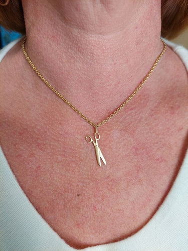 Pendentif Pendentif or jaune paire de ciseaux 58 Facettes 092141