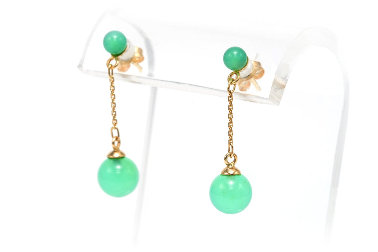 Contemporary earrings in 14-carat yellow gold set with jade 