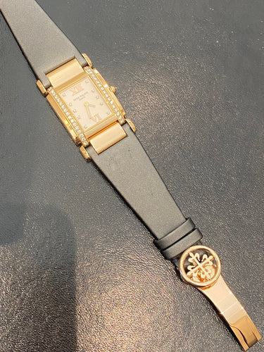 Patek Philippe - Orologio Twenty-4 con fibbia deployante in oro giallo 