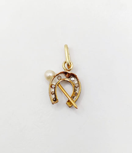 Pendentif Pendentif or jaune et platine, fer à cheval diamants taille roses et perle (circa 1900) 58 Facettes A05741