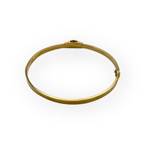 Oval bangle bracelet with opening in 18k yellow gold and sapphire, diamonds 