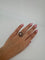 Bague 52 Bague - Or jaune rubis, saphirs et diamants 58 Facettes 1073