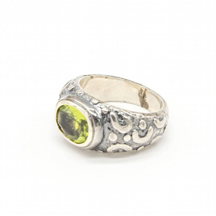 Ring aus Gold, Silber und Peridot