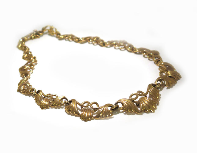 Collier ancien des années 40 en or jaune 58 Facettes