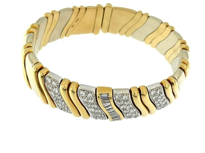 Brazalete italiano tipo mancuernas en oro amarillo y oro blanco con diamantes 