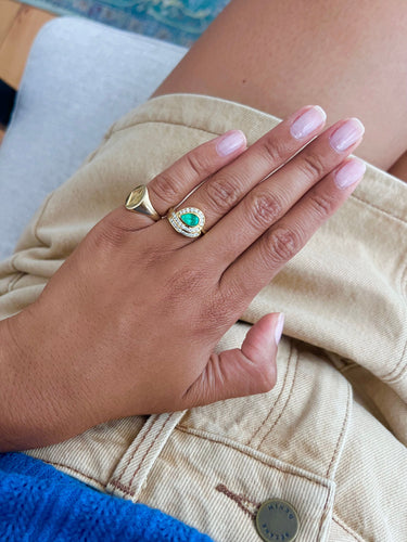 Bague 54 Bague Tourbillon or jaune, émeraude et diamants 58 Facettes