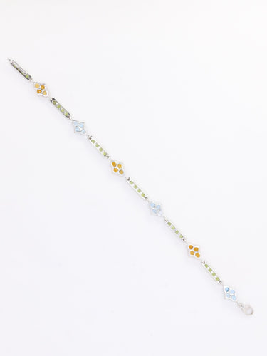 Bracelet Bracelet ligne or blanc citrines péridots topazes bleues 58 Facettes 1CA0000006/1