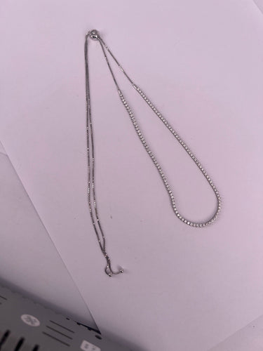 Collier Collier Tennis en or blanc et diamants 58 Facettes N-3071