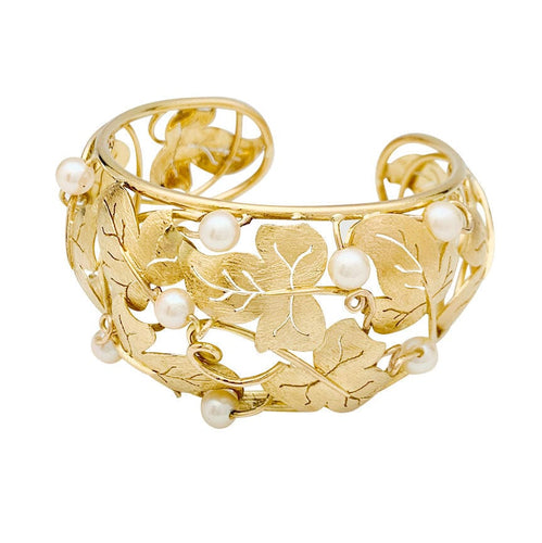 Bracelet Bracelet feuilles de lierre en or jaune et perles. 58 Facettes 31209