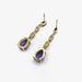 Boucles d'oreilles Boucles d'oreilles pendantes en or tanzanite et grenat tsavorite 58 Facettes