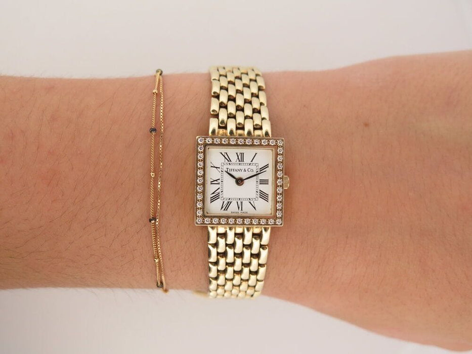 Montre vintage montre TIFFANY & CO estate 19mm or jaune 14k diamant quartz 58 Facettes 262120