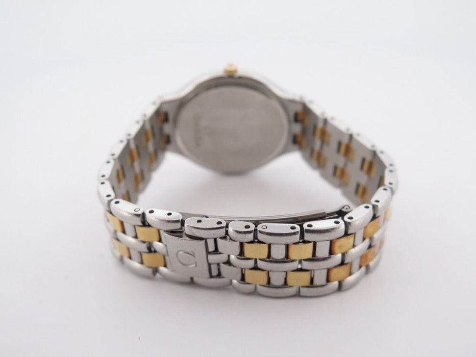Montre vintage montre OMEGA deville symbol quartz en or et acier 58 Facettes 260174