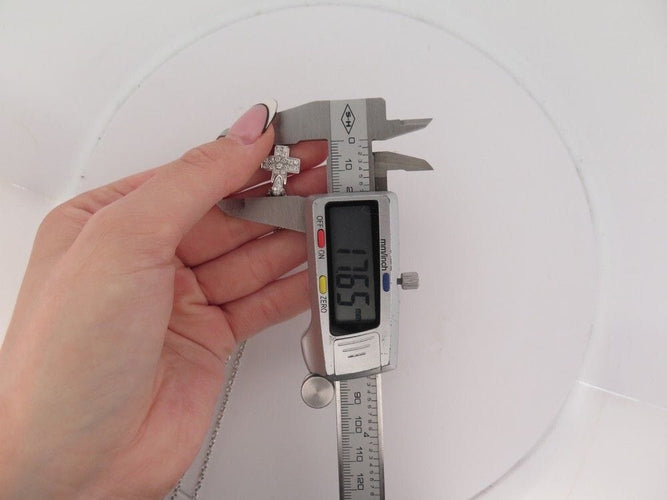 Collier collier POMELLATO pendentif croix diamants en or blanc 58 Facettes 259931