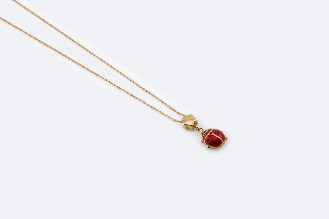 Yellow gold necklace with enameled ladybug