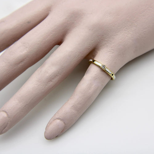 Bague Bague en or 18 carats émaillée noire et blanche avec accent de diamant 58 Facettes A20017