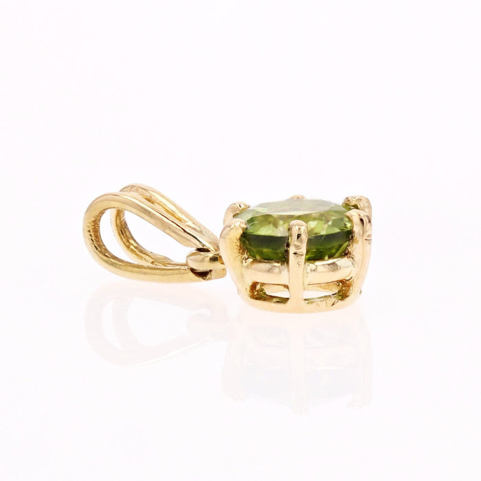 Colgante de oro peridoto