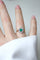 Bague 48 Bague marguerite ancienne émeraude colombienne et diamants en or jaune 18k et argent 58 Facettes