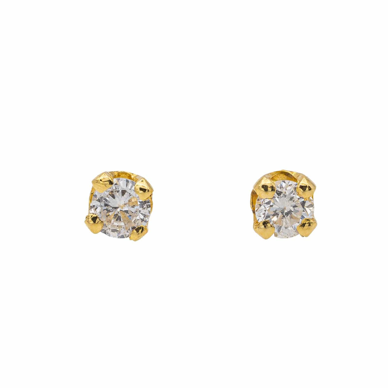 Gold stud earrings