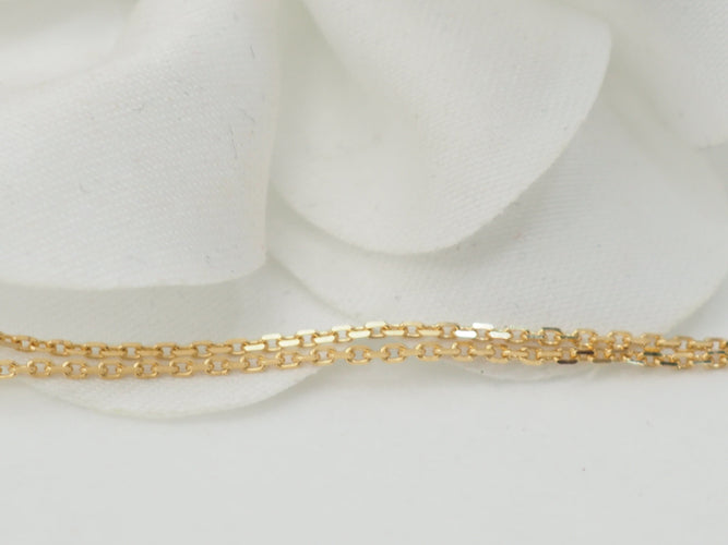 Collier Collier pendentif marguerite en or jaune et grenats 58 Facettes 33127