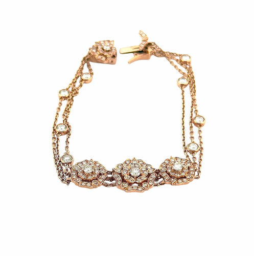 Bracelet Bracelet signé Garrard pétales de roses or et diamants 58 Facettes