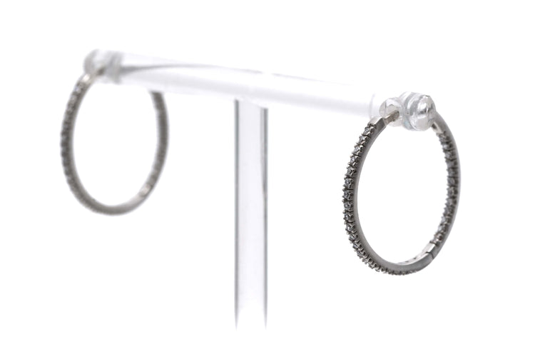 Boucles d'oreilles Créoles contemporaines en or blanc 18 carats serties de diamants taille brillant 0,64 ct 58 Facettes 23087