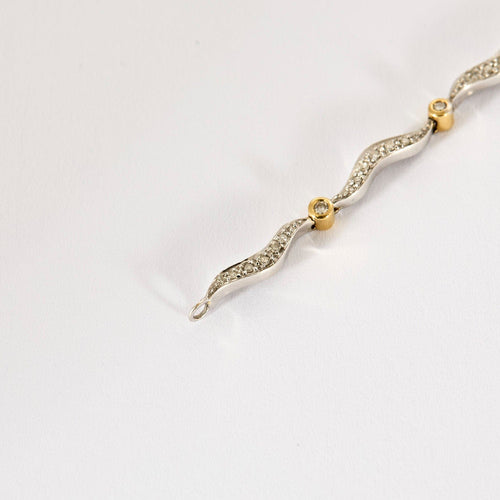 Bracelet Bracelet en or jaune, blanc et diamants 58 Facettes LP1300/17