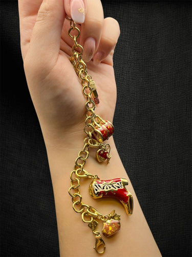 Bracelet Bracciale charms \"Pretty Woman\" en or jaune 58 Facettes