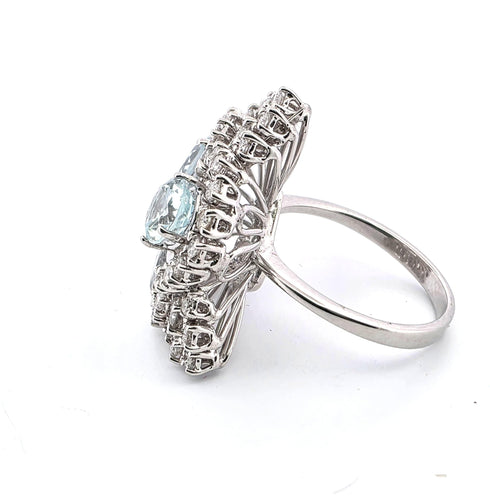 Bague 57 Bague en or blanc avec aigue-marine et diamants 58 Facettes