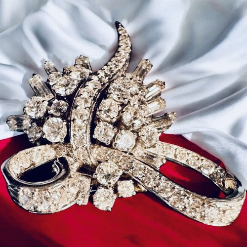 Broche Broche Art Déco en or gris, platine, diamants 58 Facettes