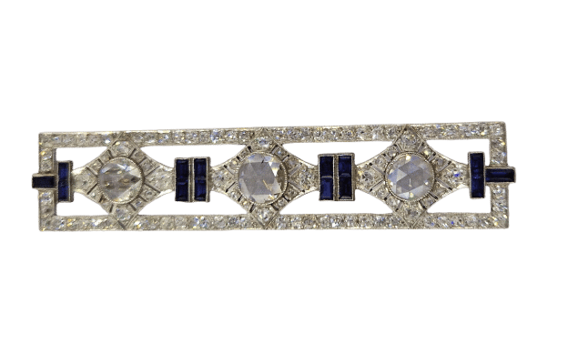 Broche Art Déco en platine avec diamants taille rose et saphirs calibrés