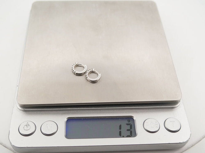 Boucles d'oreilles deux mono boucle d'oreille juliette j0485w 10mm en or blanc & diamants 58 Facettes 266850