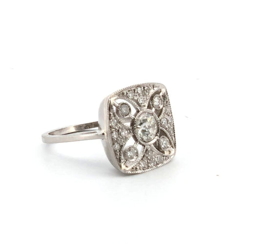 Bague 52 Bague en platine avec diamant central et diamants latéraux 58 Facettes