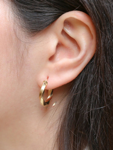 Boucles d'oreilles Créoles torsadées vintage or 58 Facettes J274