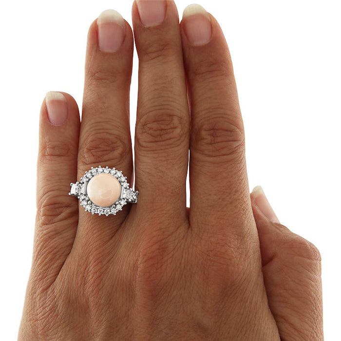 White gold ring with coral and diamonds
