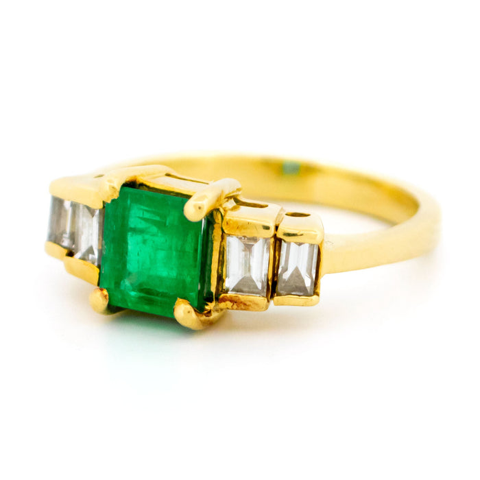 Yellow gold emerald diamond ring