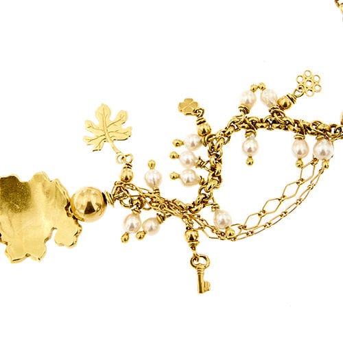 Collier Collier avec fleur en émail et breloques 58 Facettes 37280