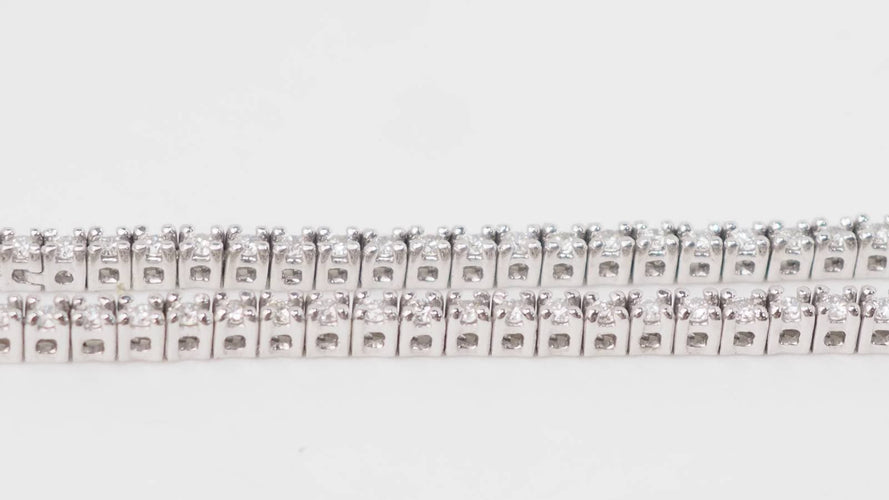 Collier Collier rivière en or blanc et diamants 58 Facettes 32848