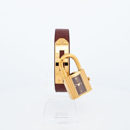 Montre Hermès - Montre Kelly en acier doré, cadran bordeaux 58 Facettes