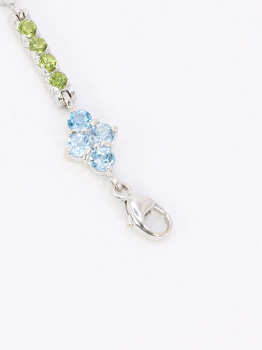 Bracelet Bracelet ligne or blanc citrines péridots topazes bleues 58 Facettes 1CA0000006/1
