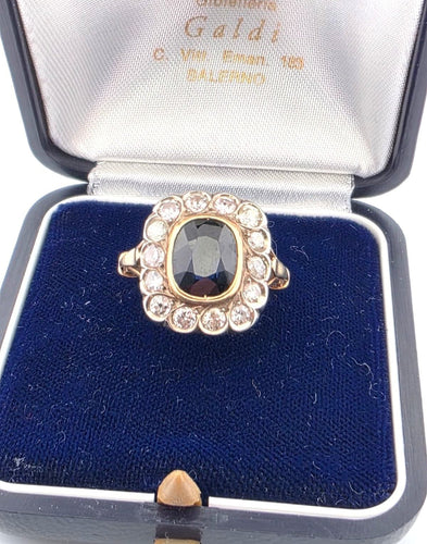 Inel din aur galben de 18 carate 2028 C cu safir central și diamante înconjurătoare 