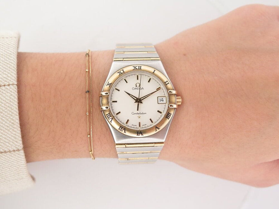 Montre vintage montre OMEGA constellation 33mm acier et or quartz lady 58 Facettes 264429